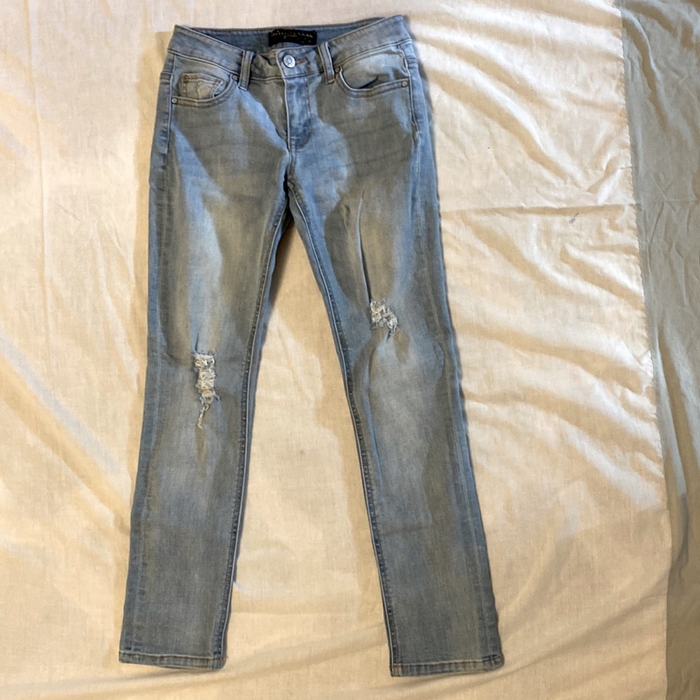 washed out denim jeans with fashionable tears